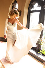 Model showcasing Jovani 24262 white gown with sweetheart neckline.