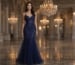 Navy beaded mermaid evening gown with tulle skirt in luxury ballroom