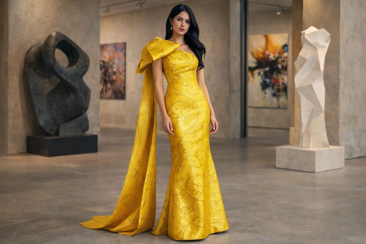 One-shoulder yellow gown with sculptural shoulder detail