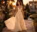 Flowy ivory botanical prom gown in garden