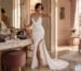 Woman in fitted satin prom gown preparing emergency kit before prom night