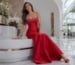 Red strapless gown editorial wedding guest look