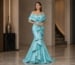 Full body turquoise off-shoulder evening gown with structured bodice and layered ruffle skirt