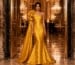 Saffron yellow mermaid evening gown at luxury gala