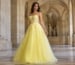 Yellow strapless ball gown with floral appliqué bodice