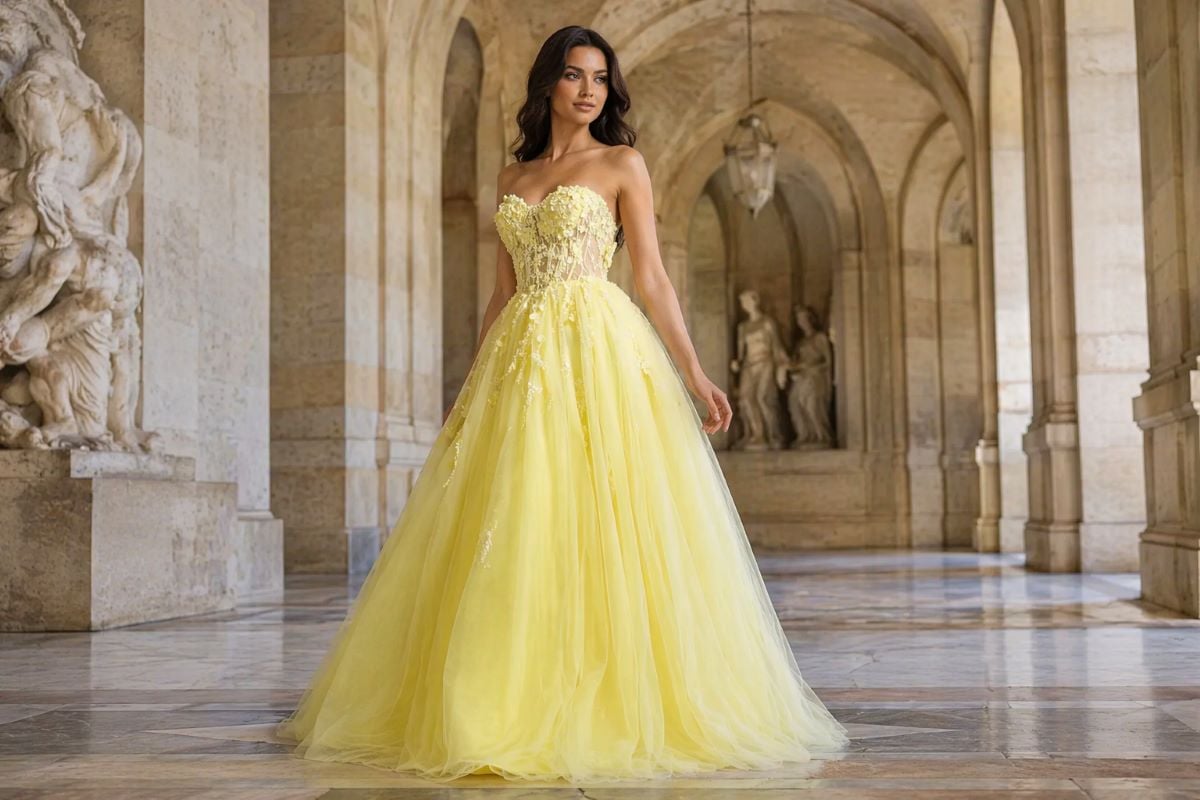 Yellow strapless ball gown with floral appliqué bodice